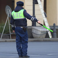 Battery powered green LED traffic baton wand for construction and road safety