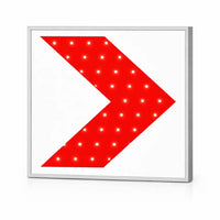 Red arrow-shaped light with white dots on a white background