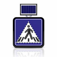 Pedestrian crossing sign with solar panel on a white background