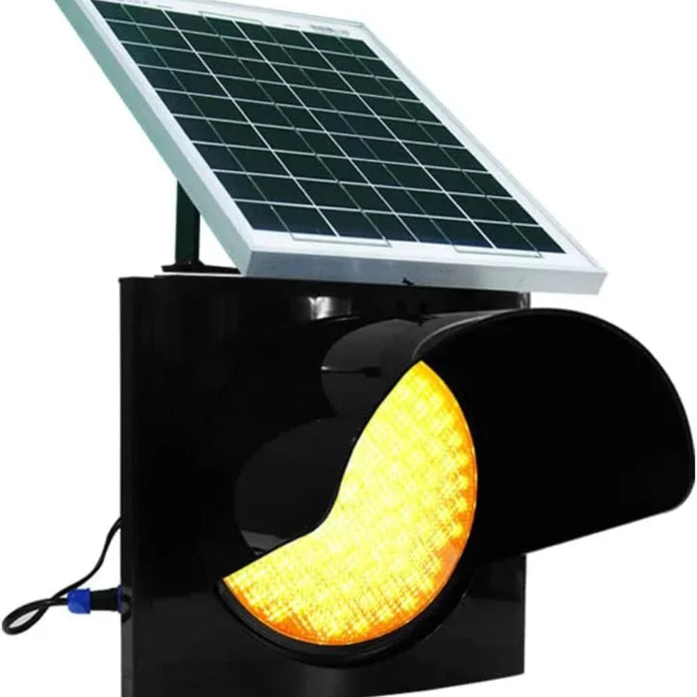 Solar-powered traffic light with a yellow warning light on a white background