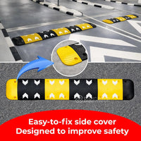 Yellow and black safety bumpers on a parking lot