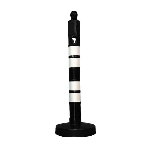 Black and white striped traffic control post on a white background