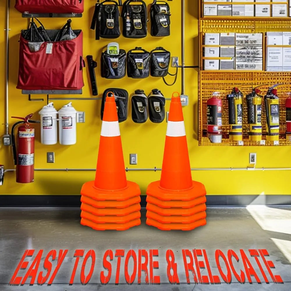 Stack of orange traffic cones in a warehouse setting