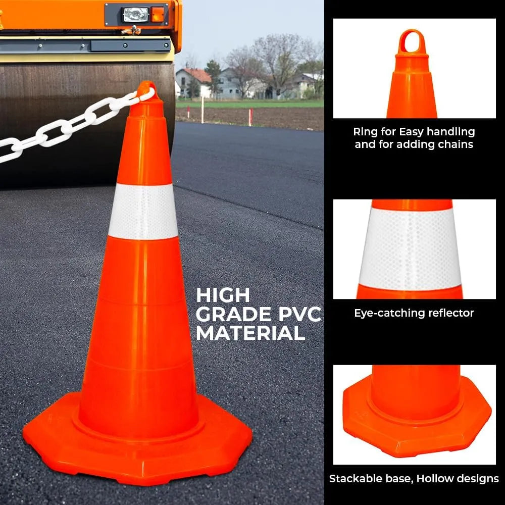 Orange traffic cone with reflective material on a road