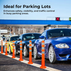 Orange traffic cones on a parking lot with cars, enhancing safety and visibility.