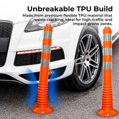 Orange flexible bollards with a white car in the background, emphasizing their durability.