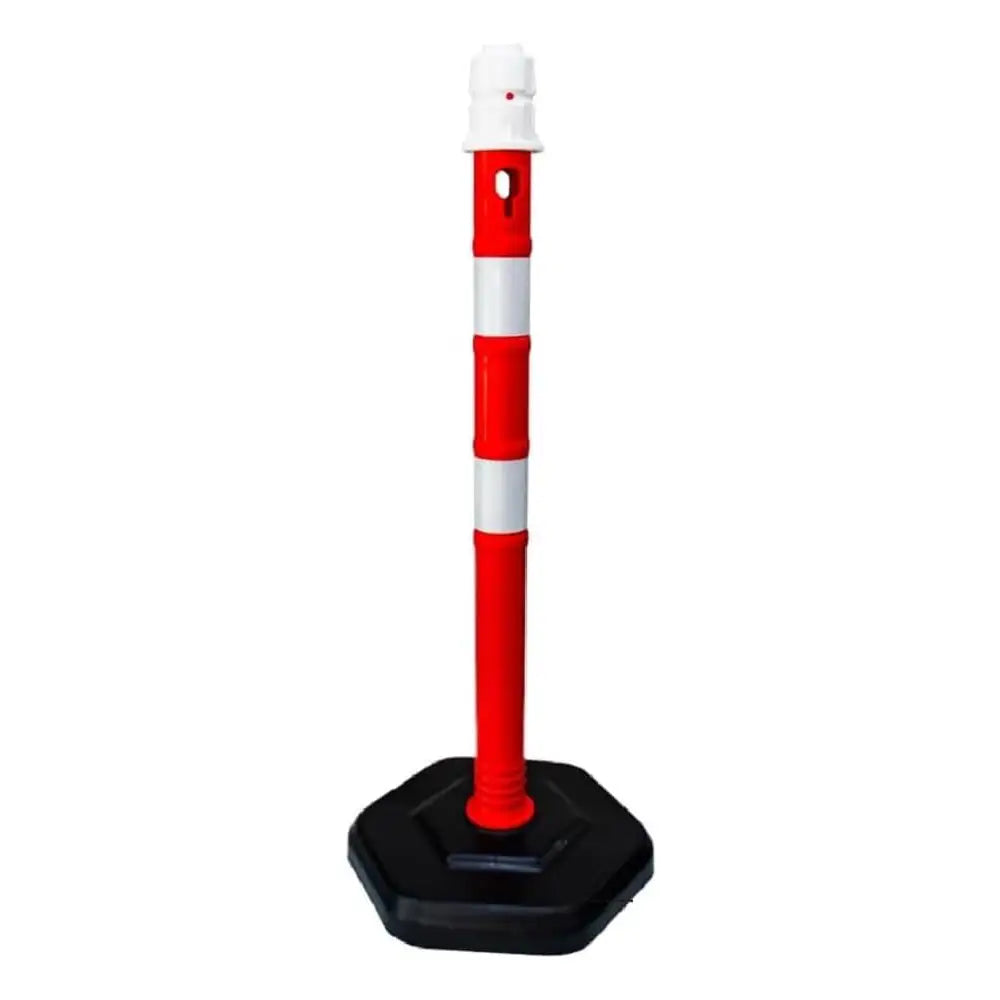 Red and white traffic barrier pole with black base 