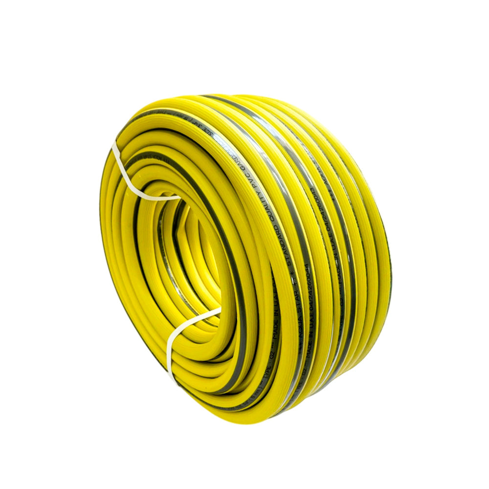 Coiled yellow hose on a white background