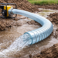 Pump with a hose dispensing water into a muddy area