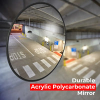 Round mirror reflecting an indoor parking area with text 'Durable Acrylic Polycarbonate Mirror' at the bottom.
