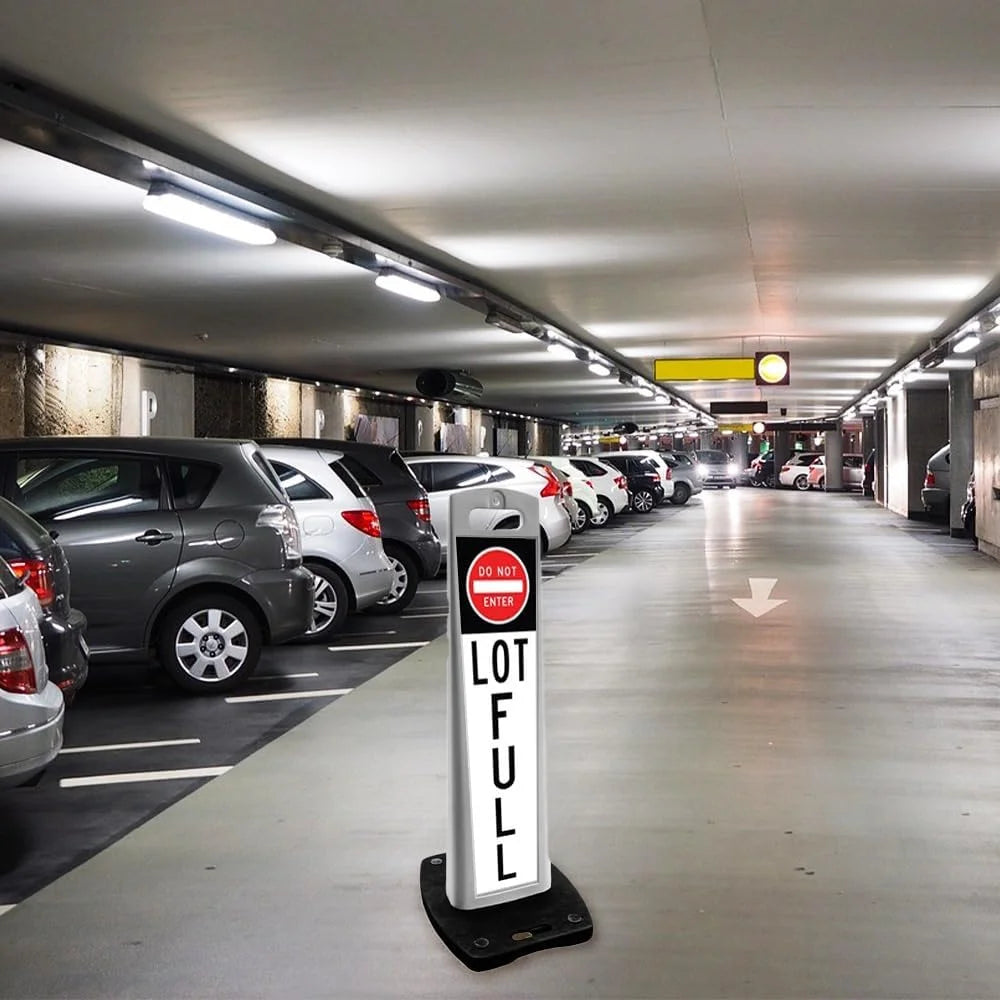 Parking garage with 'LOT FULL' sign indicating a full parking area.
