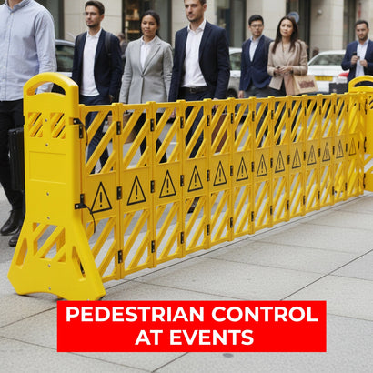 Yellow pedestrian control barrier on a sidewalk with people walking by and text 'Pedestrian Control at Events'.