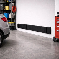 Garage interior with wall guard