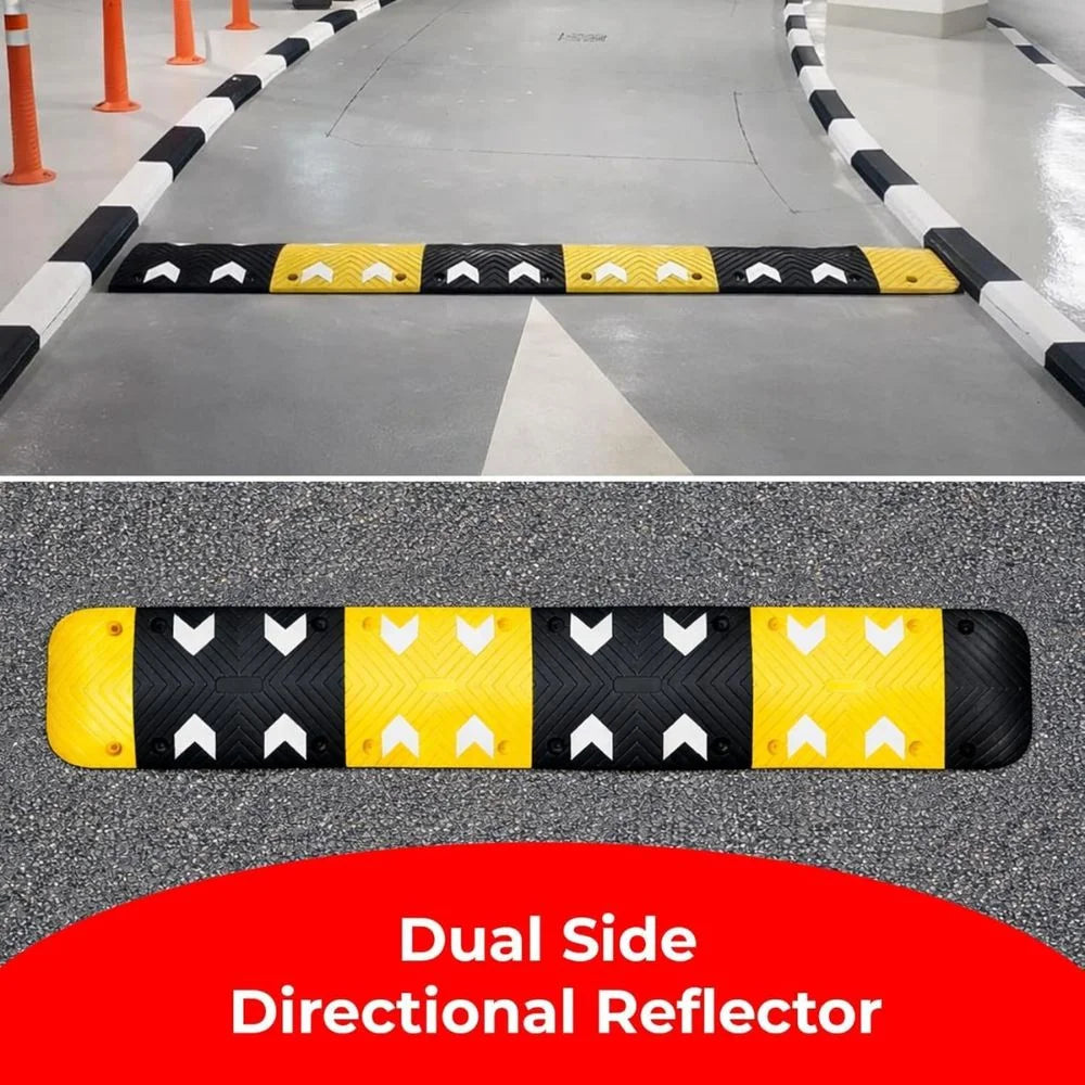 Dual-side directional reflector with black and yellow pattern on a road surface.