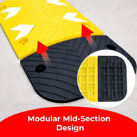 Yellow and black modular mat with textured surface on a gray background
