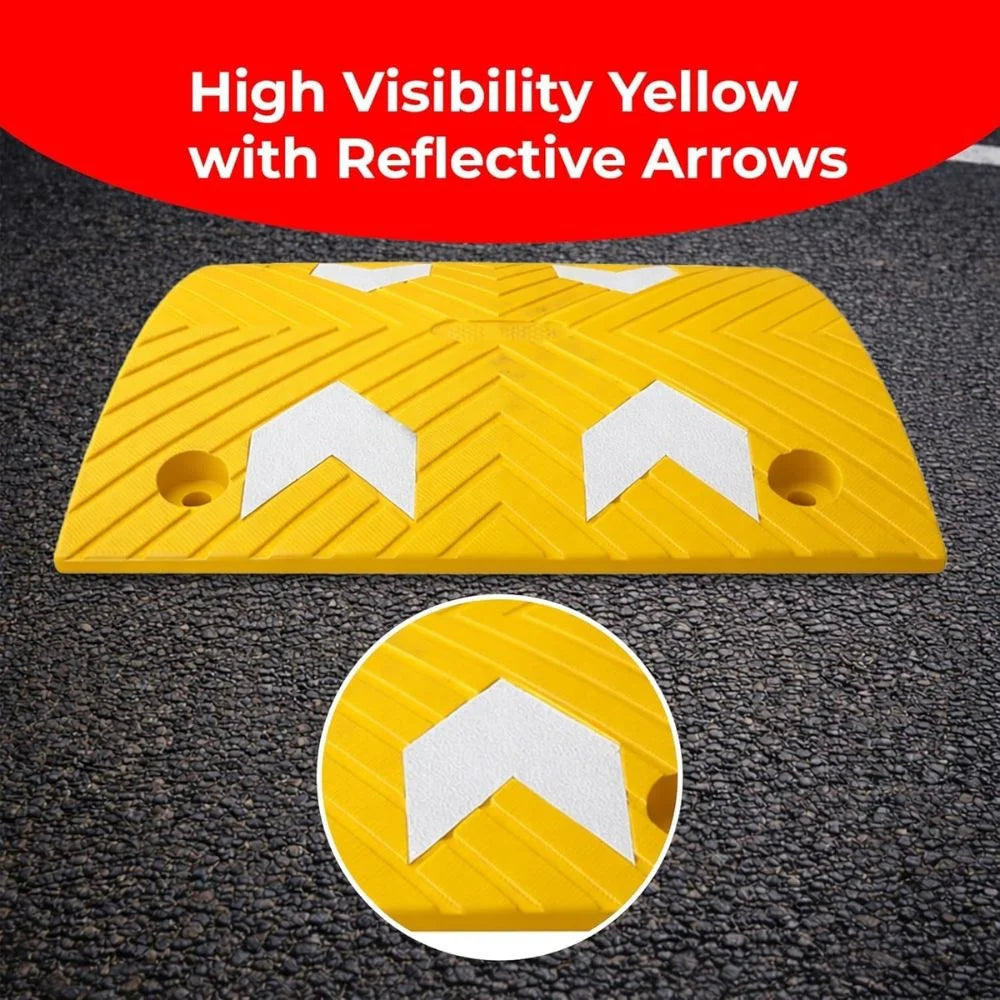 Yellow speed bump with reflective arrows on a black asphalt background, labeled 'High Visibility Yellow with Reflective Arrows'.