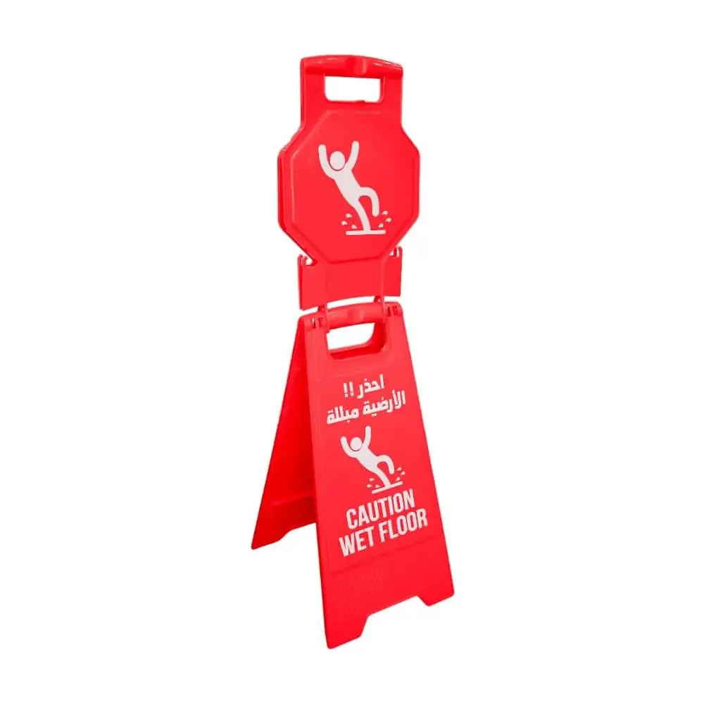 Red caution wet floor sign with Arabic text on a white background