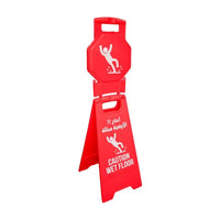 Red caution wet floor sign with Arabic text on a white background