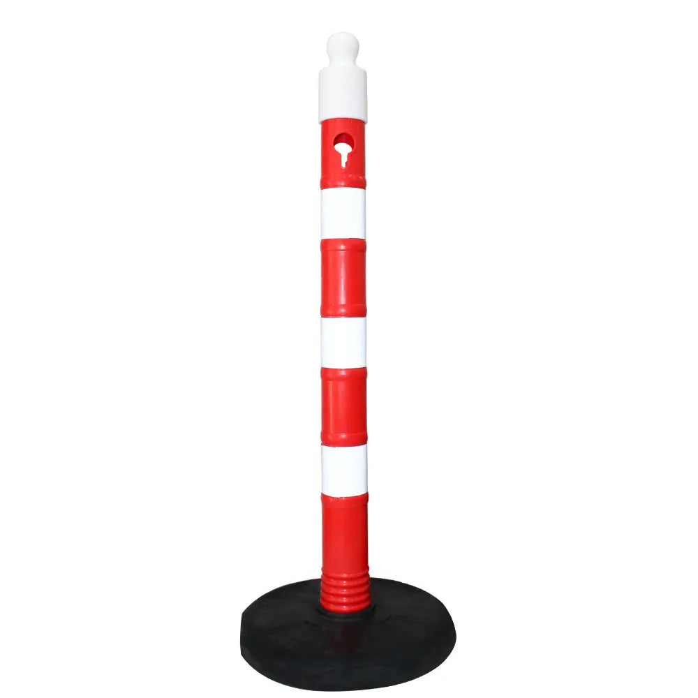 Red and white traffic safety pole with black base 