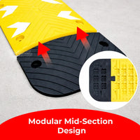Yellow and black modular speed bump with textured surface and red arrows on a gray background.