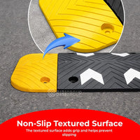Yellow and black speed bump with non-slip textured surface 