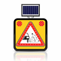 Road warning sign with solar panel on a white background