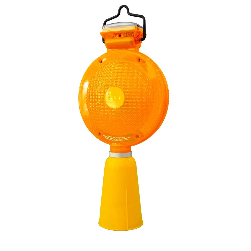 Orange traffic light-style lamp on a white background