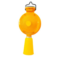 Yellow safety light with a white base on a white background