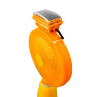 Orange traffic light on a white background