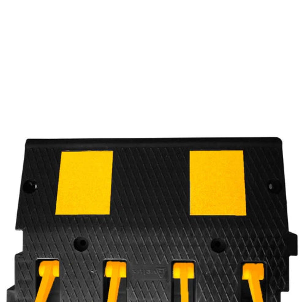 Black and yellow traffic bump with a white background