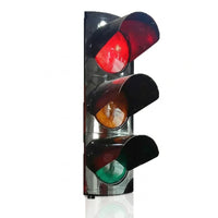 Three-way traffic light with red, yellow, and green lights 
